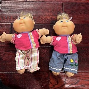 Cabbage patch kids dolls with tons of clothing